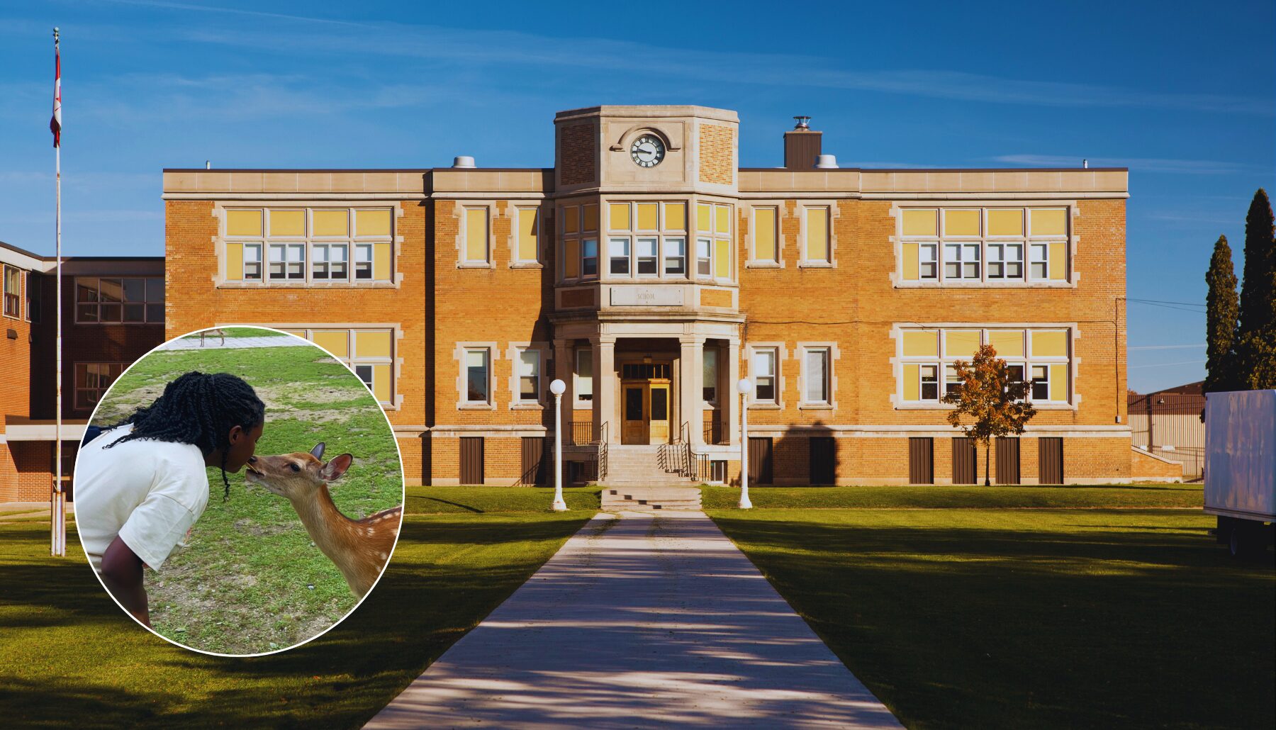 classic two story high school building made of bricks with headshot of Daryn in the lower left