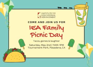 IEA Family Picnic Day invitation featuring illustrated taco, lemonade, popsicles, and kites
