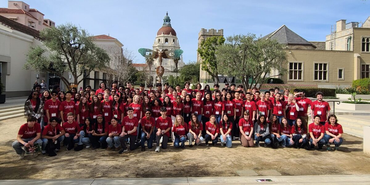 100 CDB Scholars in red T-shirts in front of Pasadena City Hall